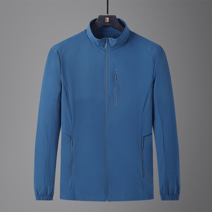 Men's Lightweight Softshell Jacket with Stand-Up Collar, Wind and Water-Repellent Surface, and Zipper Pockets Mune Fashion