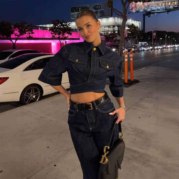 Women's cropped denim jacket with boxy silhouette, flap pockets, and shortened waistline Mune Fashion