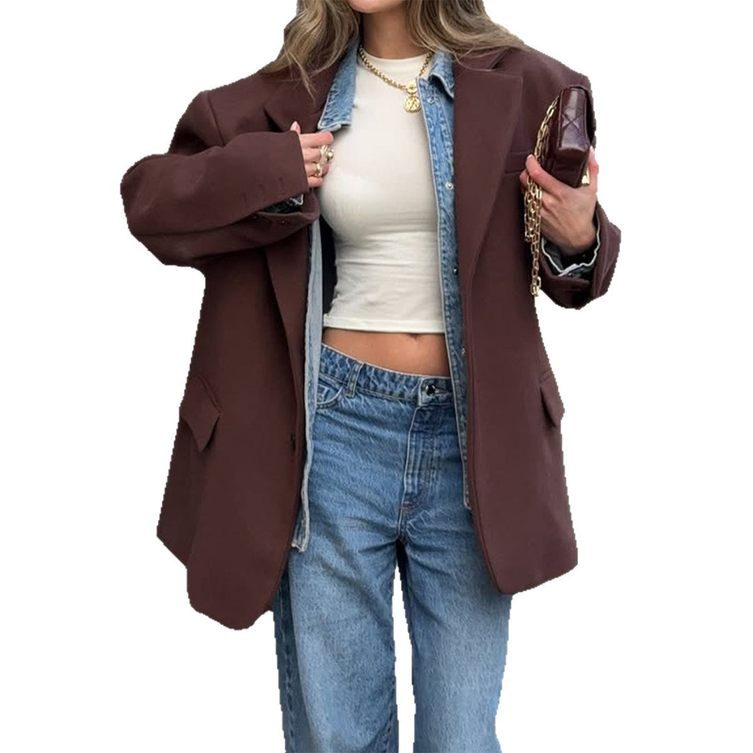 Women's oversized long blazer with boxy cut, notched lapel, padded flap pockets, and textured wool blend Mune Fashion