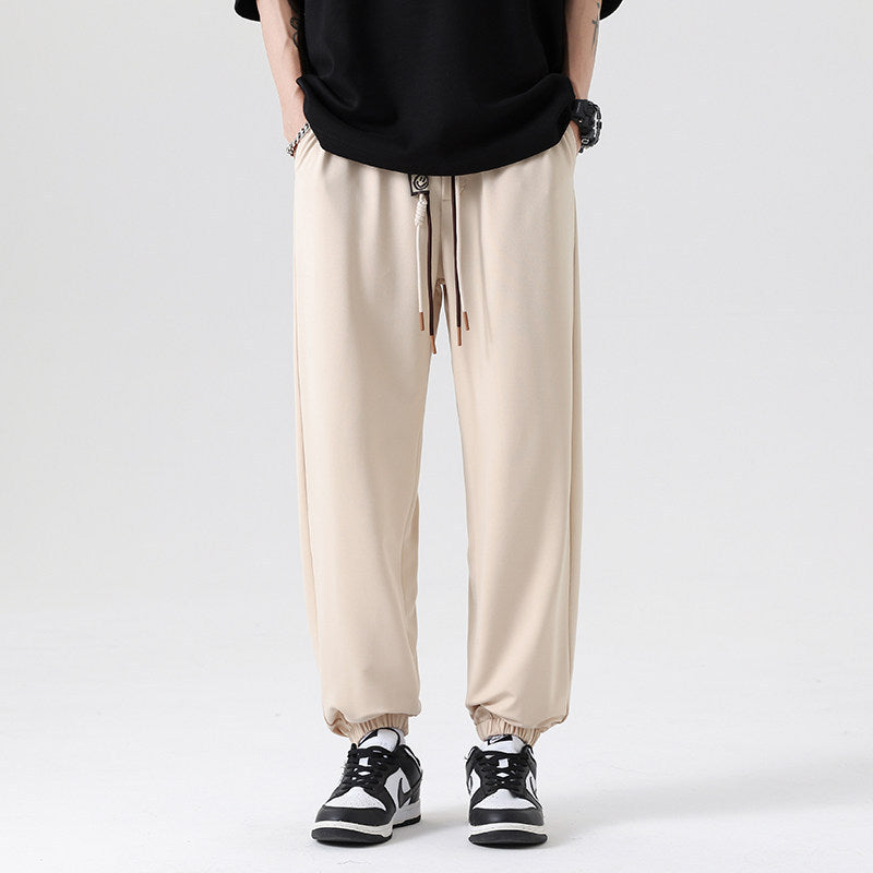 Men's Wide Jogging Pants in a Loose Fit with Adjustable Drawstring, Elastic Ankle Cuffs, and Soft Touch Mune Fashion