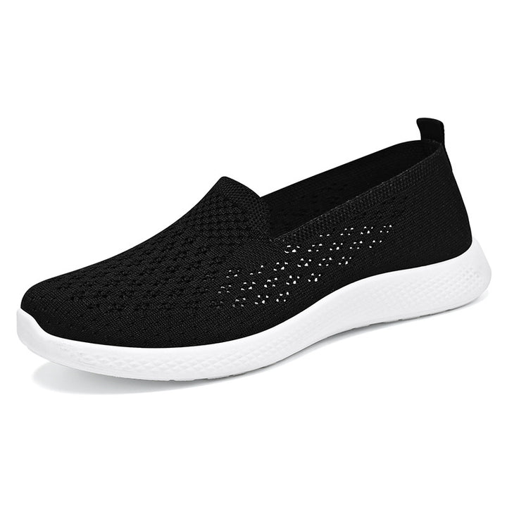Women’s seamless knit slip-on with perforated air mesh structure, ergonomic memory footbed, and lightweight EVA cushioning Mune Fashion