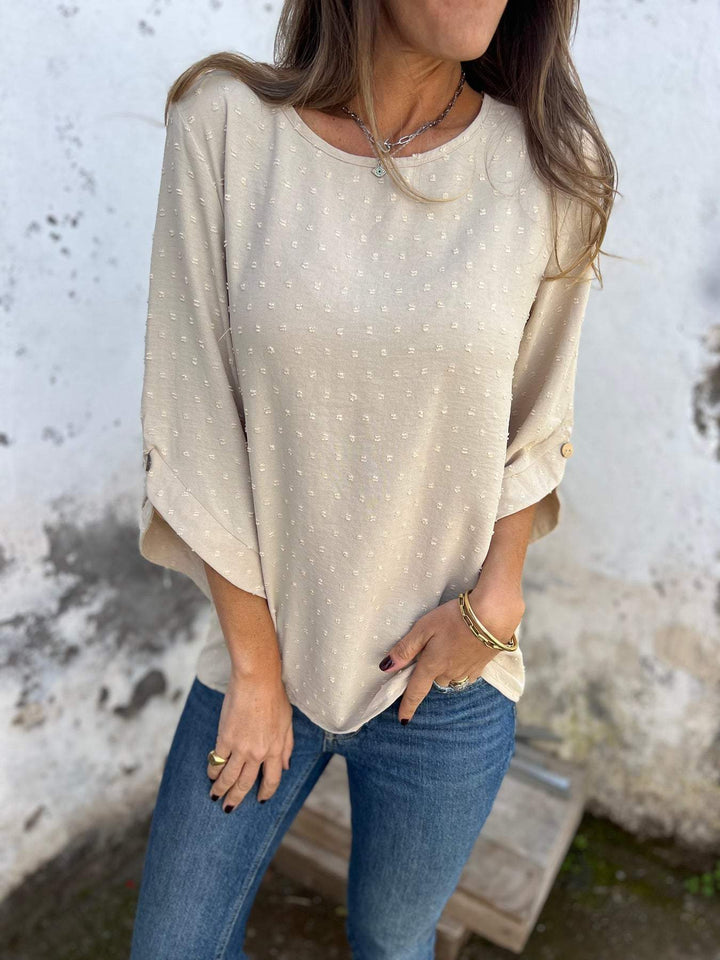 Ladies blouse with textured dot pattern and three-quarter sleeves Mune Fashion