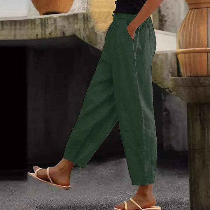 Women's loose-fitting linen blend pants with elastic waistband, drawstring, and angled side pockets Mune Fashion