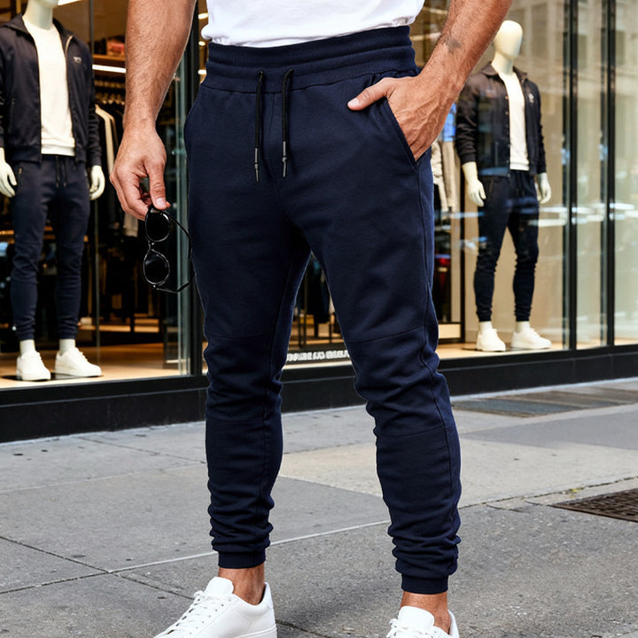 Men's nan tapered jogging pants with knee yoke, elastic drawstring waistband and zippered pockets Mune Fashion