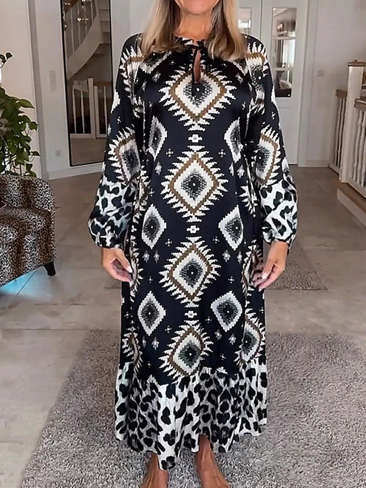 Women's flowing maxi dress with ethnic diamond print, keyhole neckline and contrast ruffle Mune Fashion