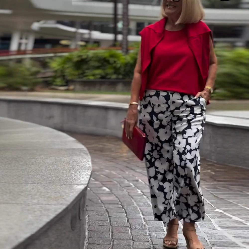 Women's wide Palazzo pants with large floral print, high waistband and side pockets Mune Fashion