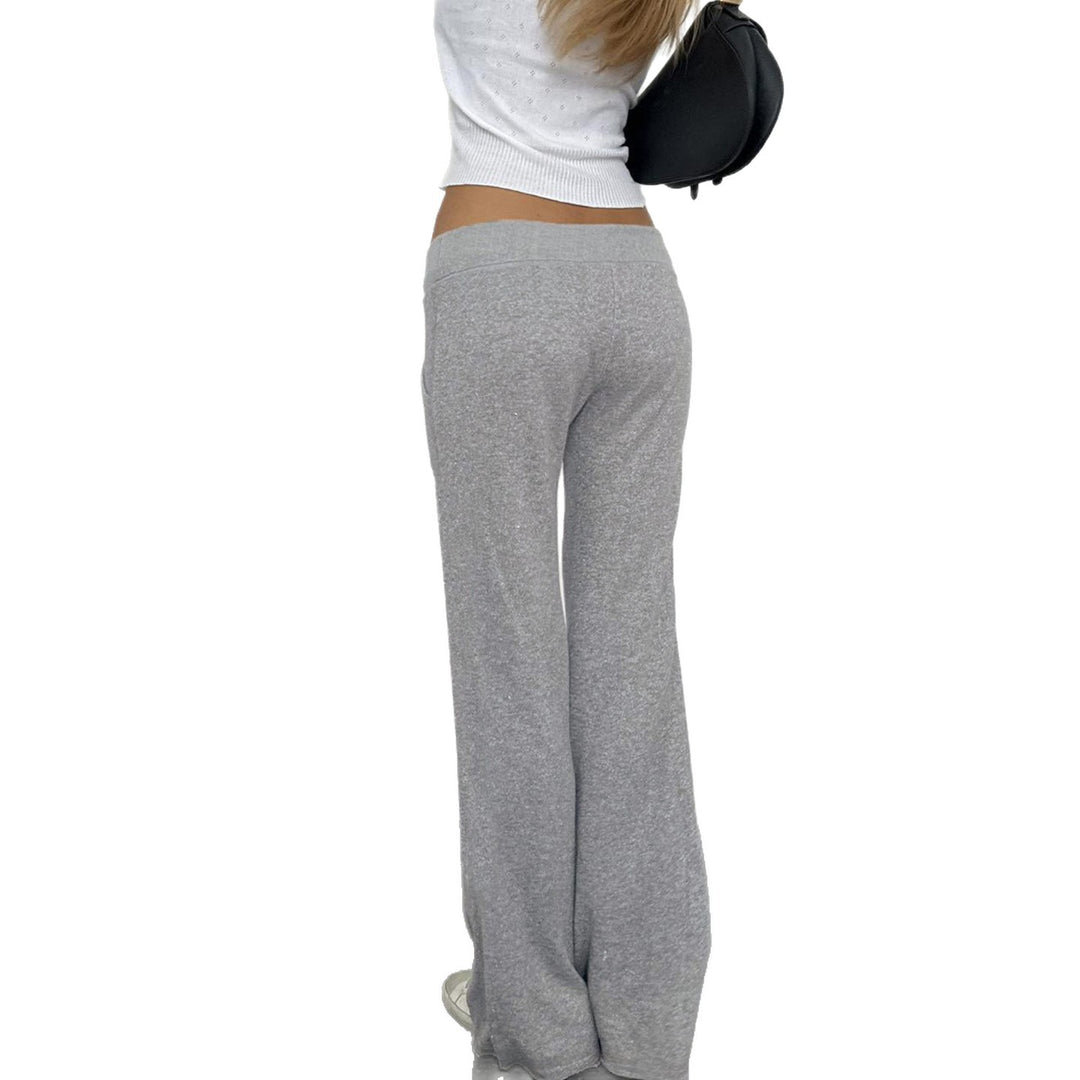 Women's soft flared jogging pants with drawstring, side pockets, and eye-catching Love print Mune Fashion