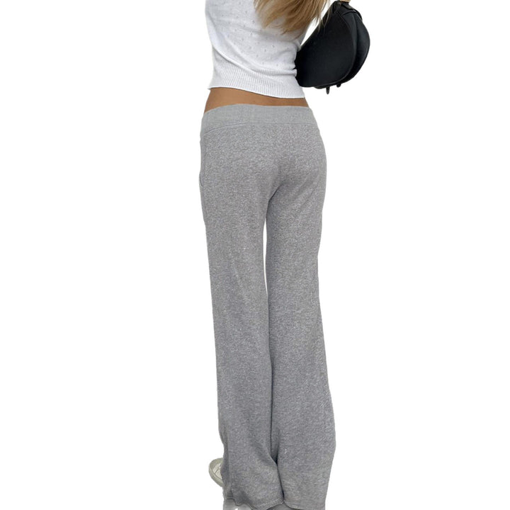 Women's soft flared jogging pants with drawstring, side pockets, and eye-catching Love print Mune Fashion