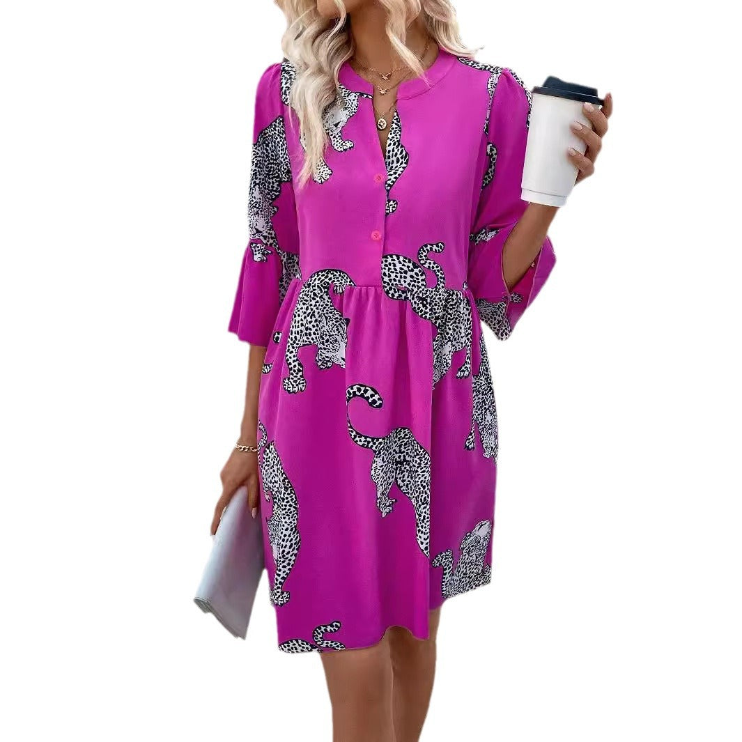 Women's casual tunic dress with gathered waist seam, button placket, and graphic animal silhouette print Mune Fashion