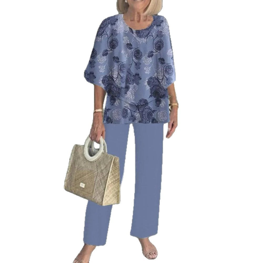 Women's layered tunic with cape sleeves and ankle-length straight leg pants with graphic print Mune Fashion