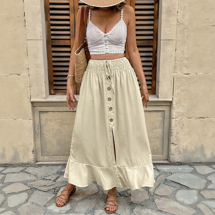 Ladies summer maxi skirt with smocked waistband, full button placket, side slit and ruffles