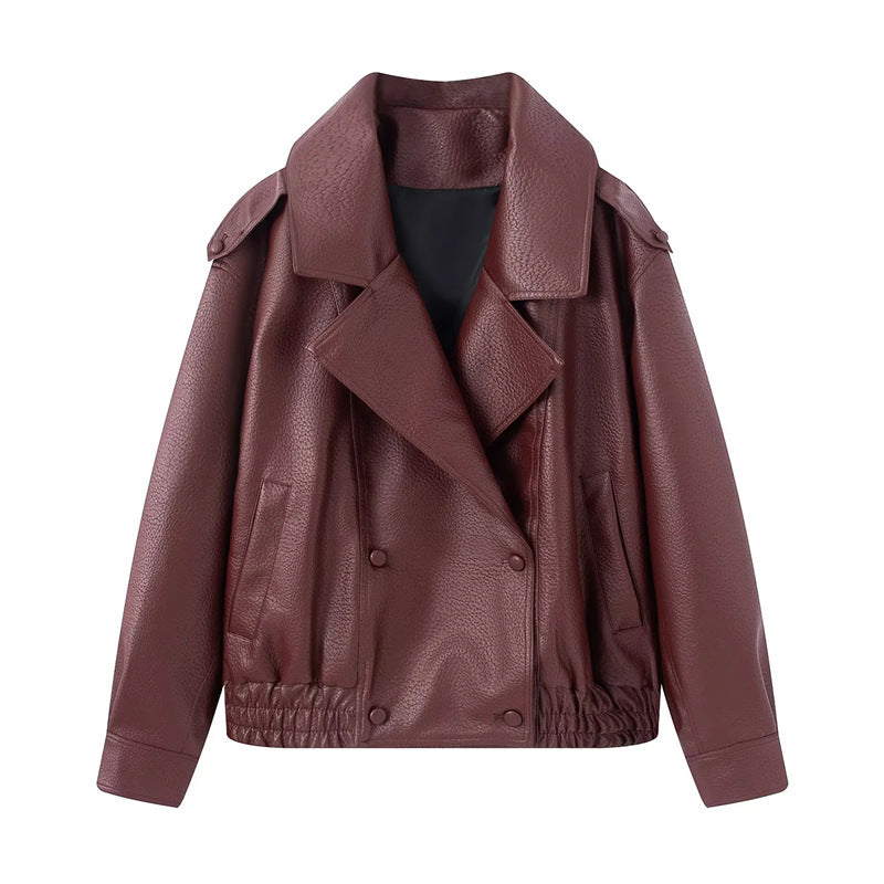Women's short oversized faux leather blouson with shawl collar, snap button double row and elastic hem Mune Fashion