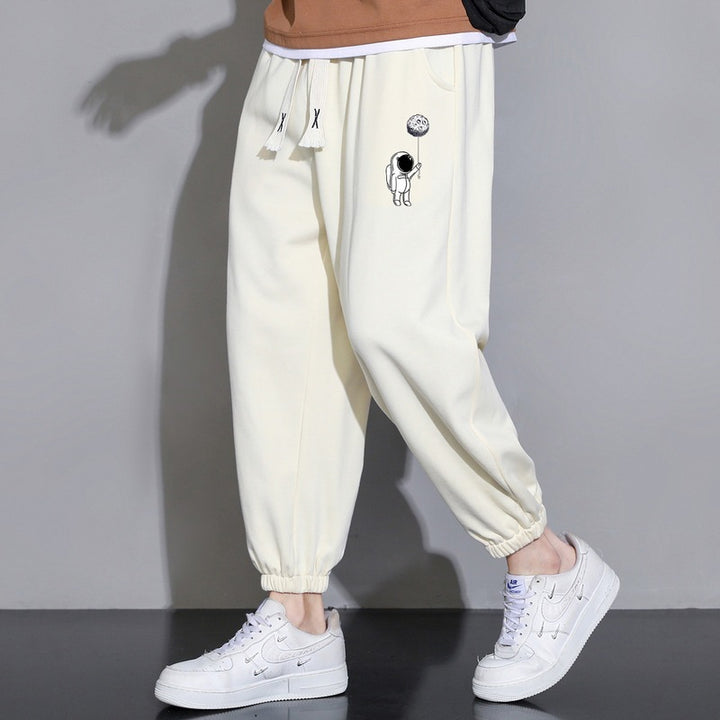 Men's Loose Jogging Pants with Astronaut Print, Drawstring Waistband and Elastic Cuffs Mune Fashion