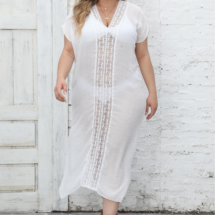 Ladies elegant maxi kaftan with generous V-neckline and delicate crochet accents Mune Fashion