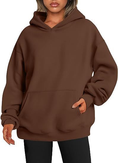 Women's oversized hooded sweatshirt made of soft cotton blend with kangaroo pocket Mune Fashion