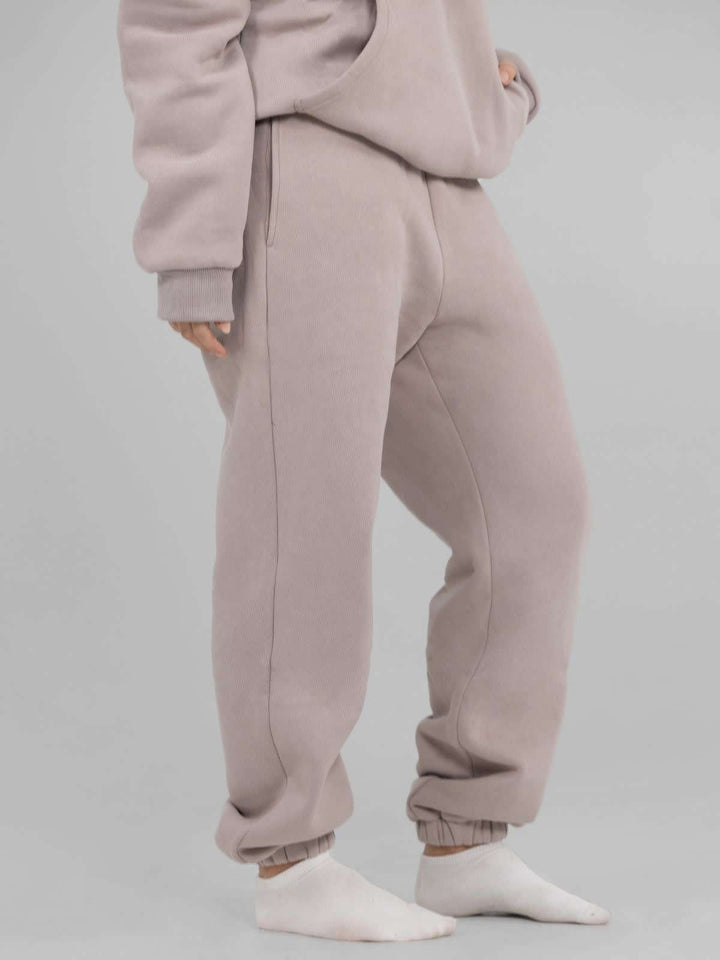 Women's casual sweatpants with high waistband, side pockets and elastic cuffs Mune Fashion