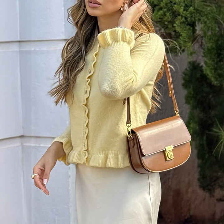 Women’s short cut knit cardigan with ruffled button placket and gathered cuffs Mune Fashion