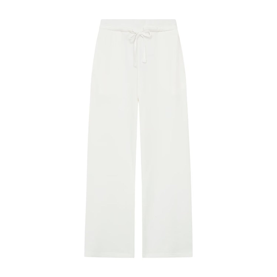 Women's wide high-waist palazzo pants with elastic waistband and flowing silhouette Mune Fashion
