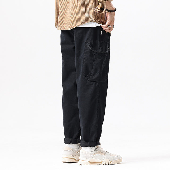 Men's utility cargo pants in relaxed tapered fit with elastic waistband and large flap pockets Drune