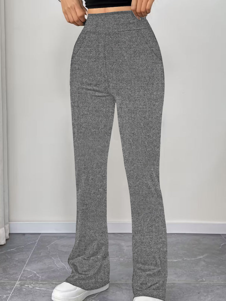 Women's flared pants made of stretch knit with high waist and side pockets Mune Fashion