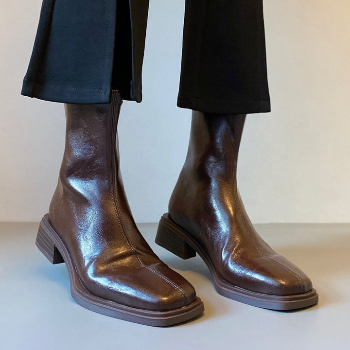 Women ankle boots in riding boot look made of soft smooth leather with square toe seam and stacked block heel Mune Fashion