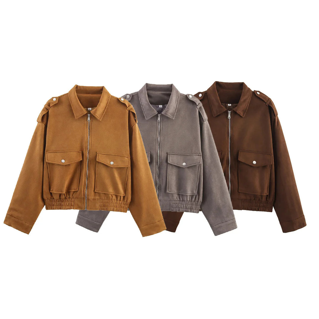 Women's cropped utility jacket with shoulder epaulettes, applied flap pockets, and elastic hem Mune Fashion