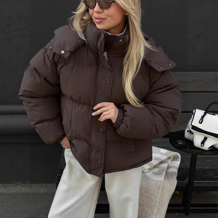 Women's short-cut oversized quilted jacket with high stand-up collar and concealed snap button placket Mune Fashion