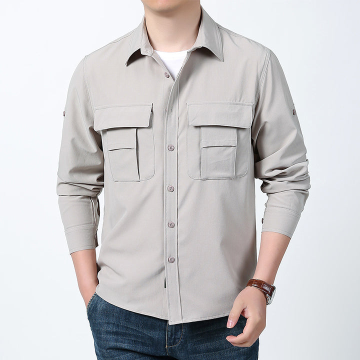 Men's functional field shirt with concealed button placket, applied multiple chest pockets and roll-up sleeves Mune Fashion