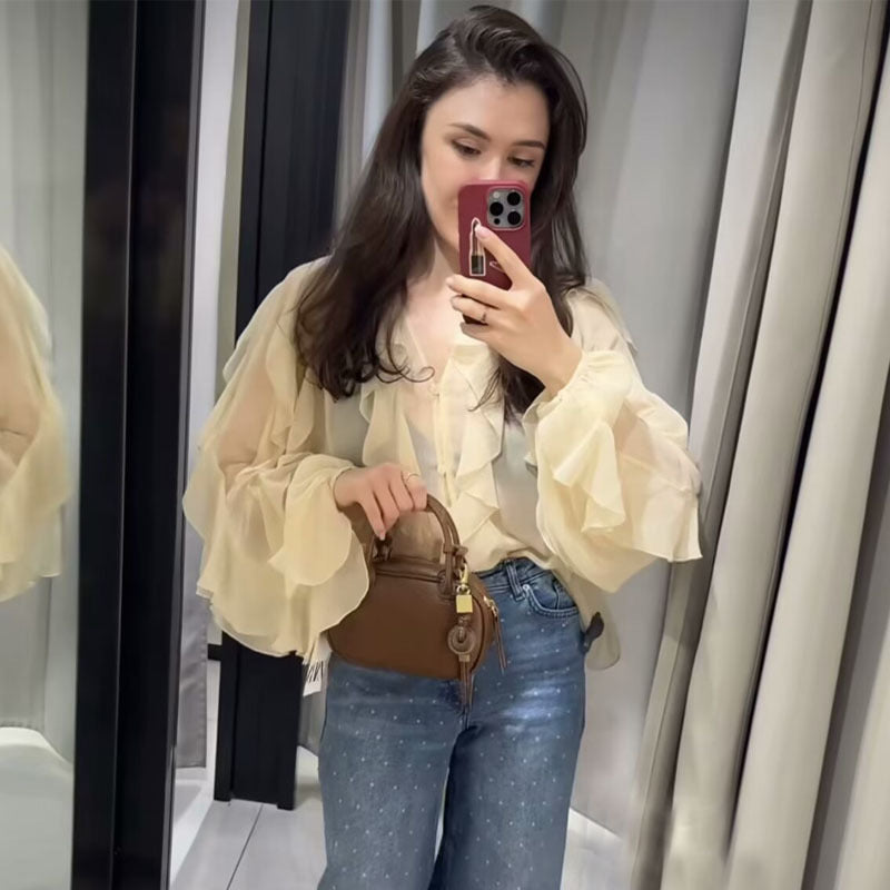 Ladies sheer chiffon blouse with layered ruffles, wide balloon sleeves, and full button placket Mune Fashion