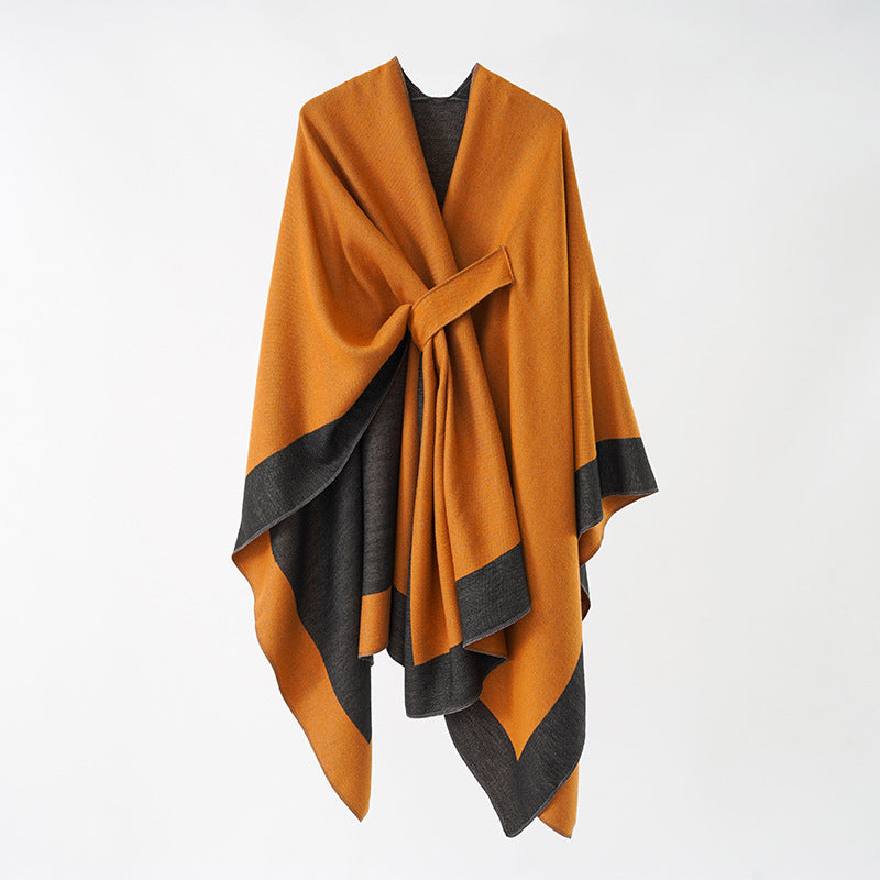 Women's loosely cut cape made of wool blend with tie belt and contrasting edges Mune Fashion