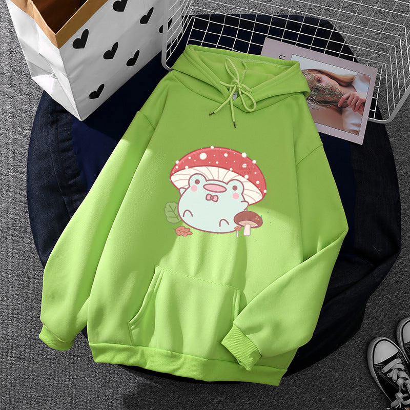 Women’s soft oversized hoodie with kawaii mushroom frog print, kangaroo pocket, and ribbed cuffs Mune Fashion
