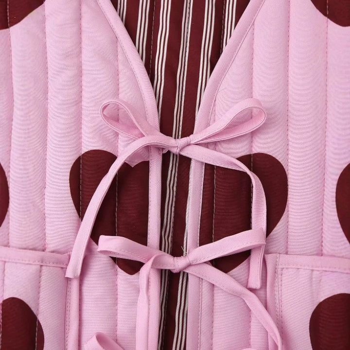 Women quilted vest with heart appliqués and ties Mune Fashion