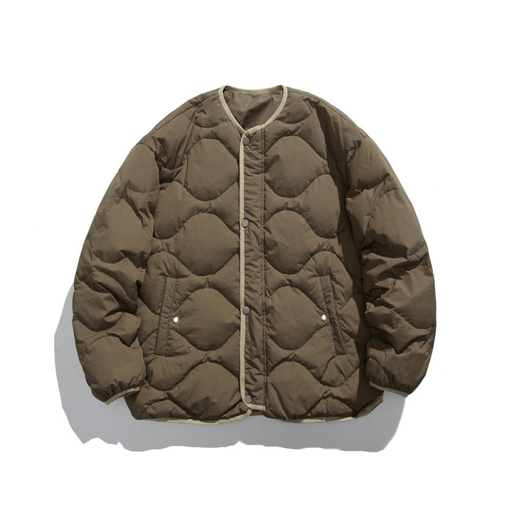 Unisex Kastig padded short jacket with circular quilting, round neckline and contrast piping Mune Fashion