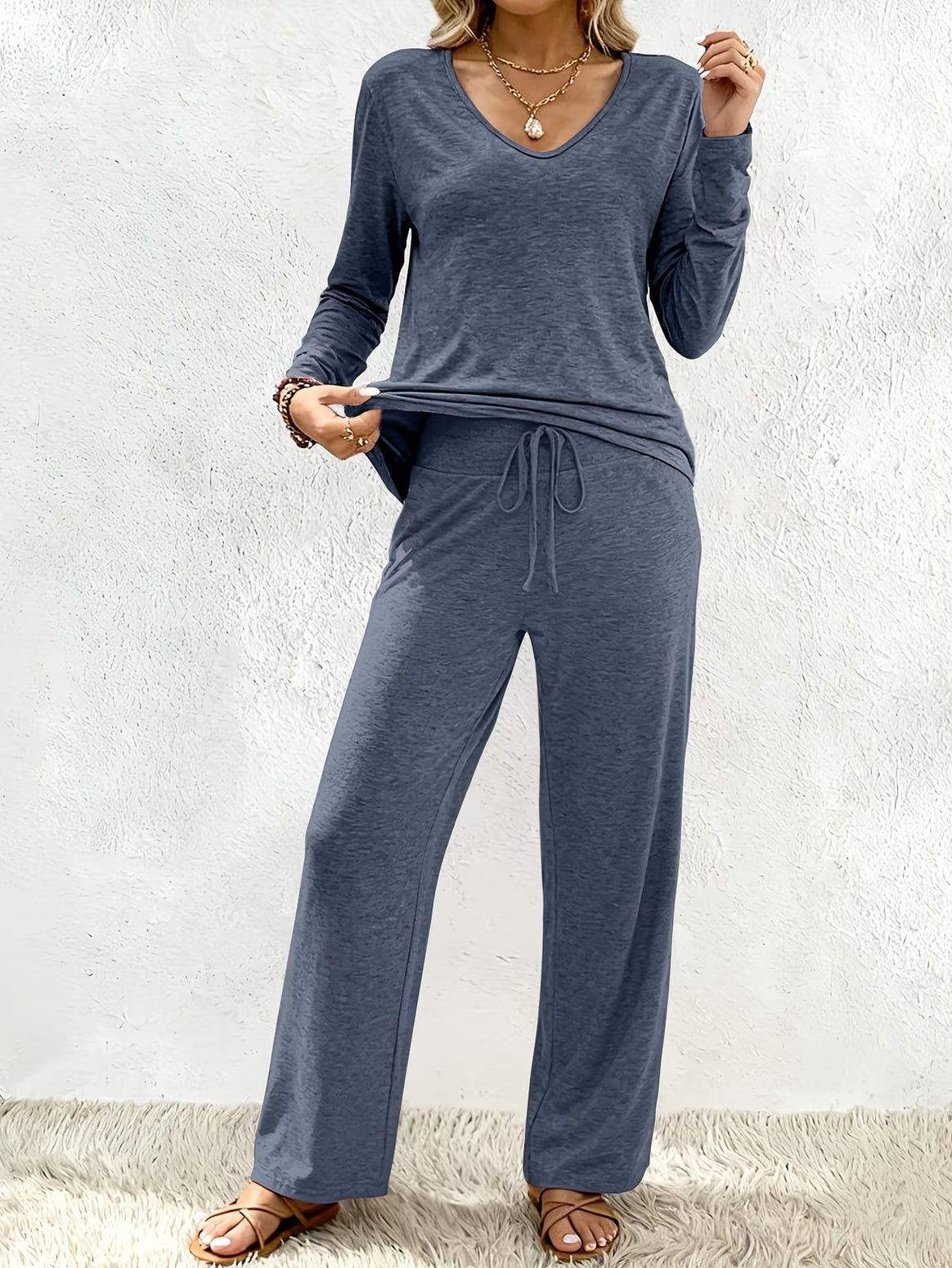 Women’s lounge set made of soft viscose-modal blend with V-neck, drawstring pants, and wide leg Mune Fashion