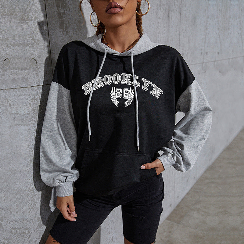 Women's Oversized Hoodie in College Style with Color Block Sleeves, Kangaroo Pocket and Drawstring
