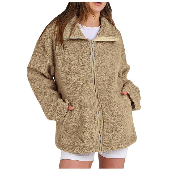 Women's oversized teddy fur jacket with stand-up collar, zipper, and patch pockets Mune Fashion