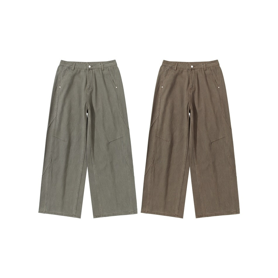 Women's wide pleated trousers in utility cargo style with high waist and prominent seam details Mune Fashion