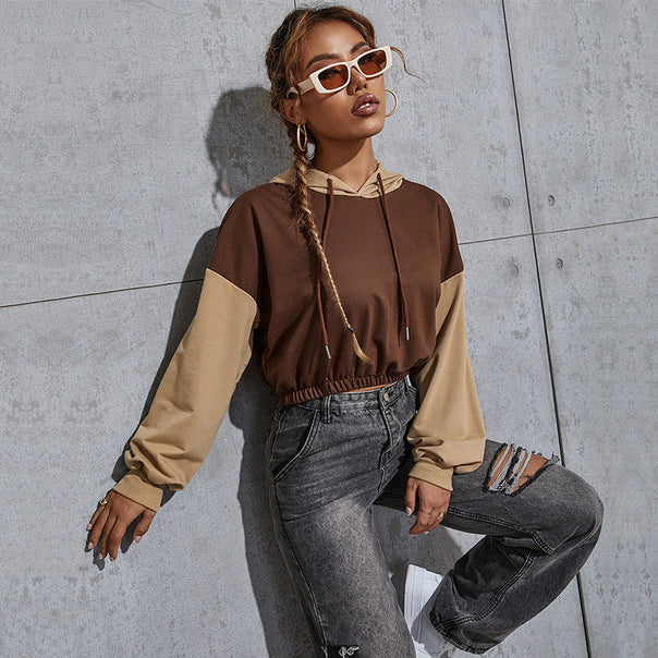 Ladies short cut cropped hoodie with color block sleeves, drawstring and elastic hem Mune Fashion
