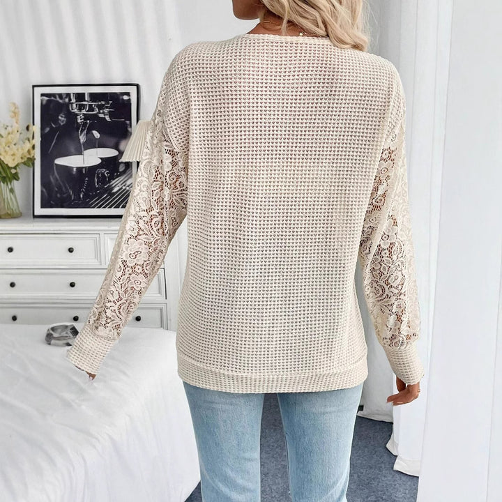 Women's slightly tailored waffle knit sweater with floral lace inserts on the sleeves Mune Fashion