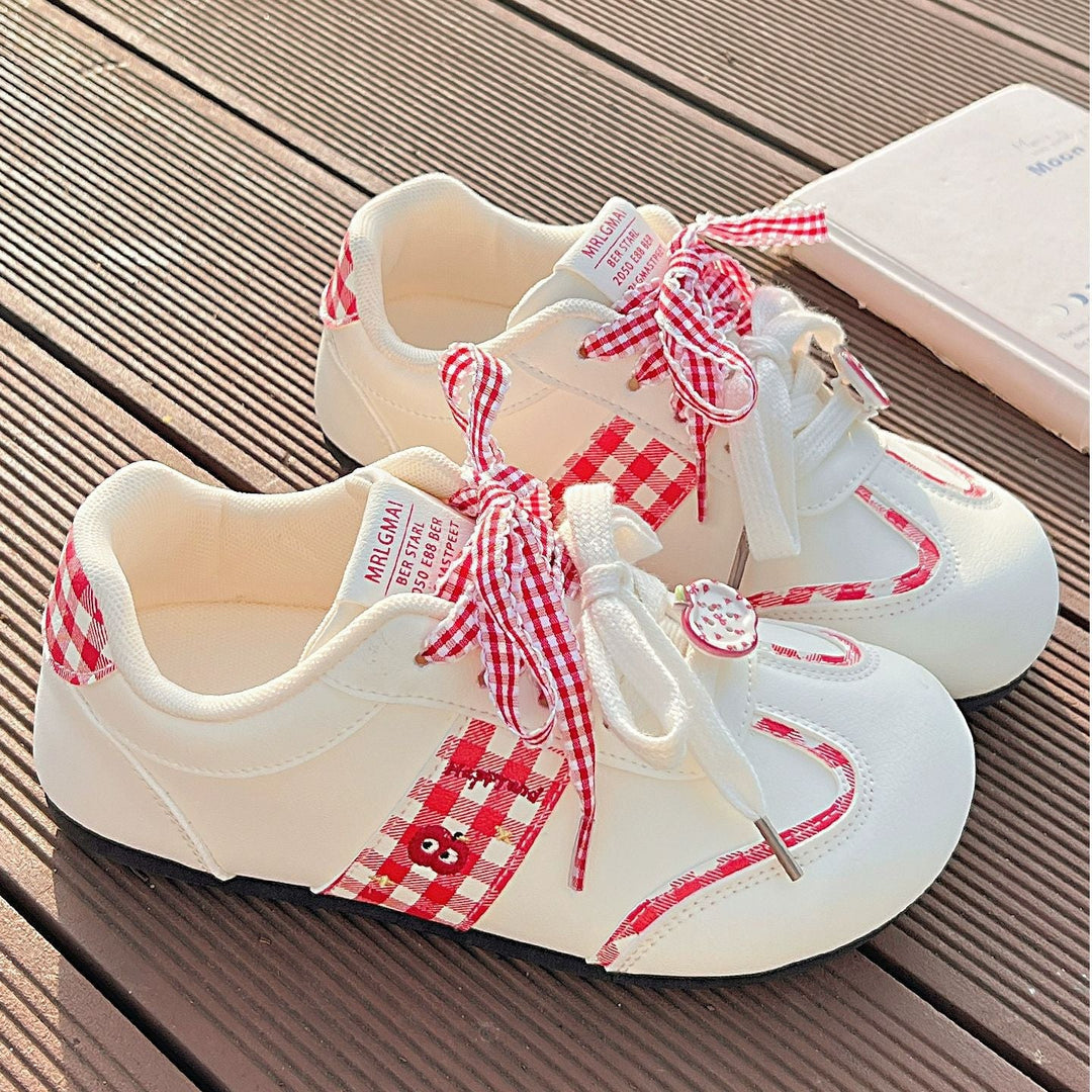 Women's sneakers with playful check pattern and decorative bows Mune Fashion