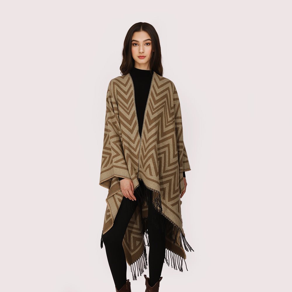 Women's oversized cape with a graphic zigzag pattern and long fringes
