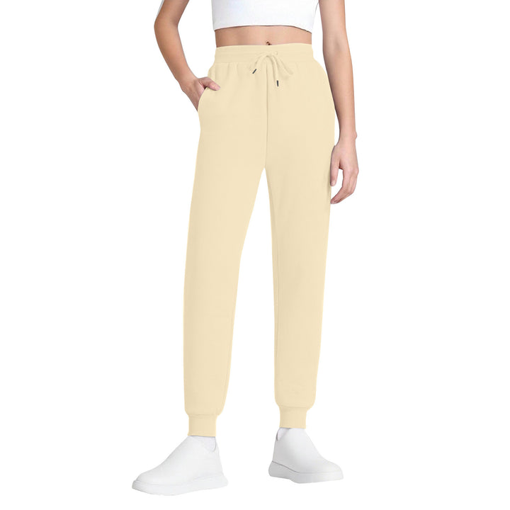 Women's slim high-waisted joggers with drawstring, side pockets, and cuffs Mune Fashion