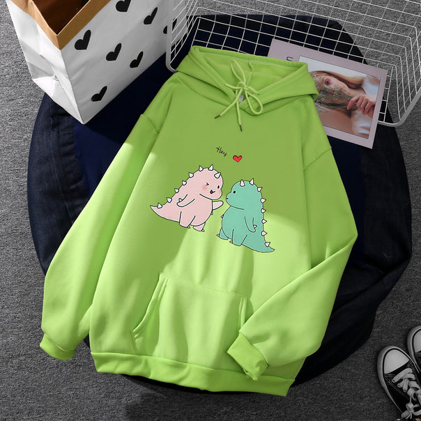 Women's hoodie with cute dinosaur couple illustration, oversized cut and kangaroo pocket Mune Fashion