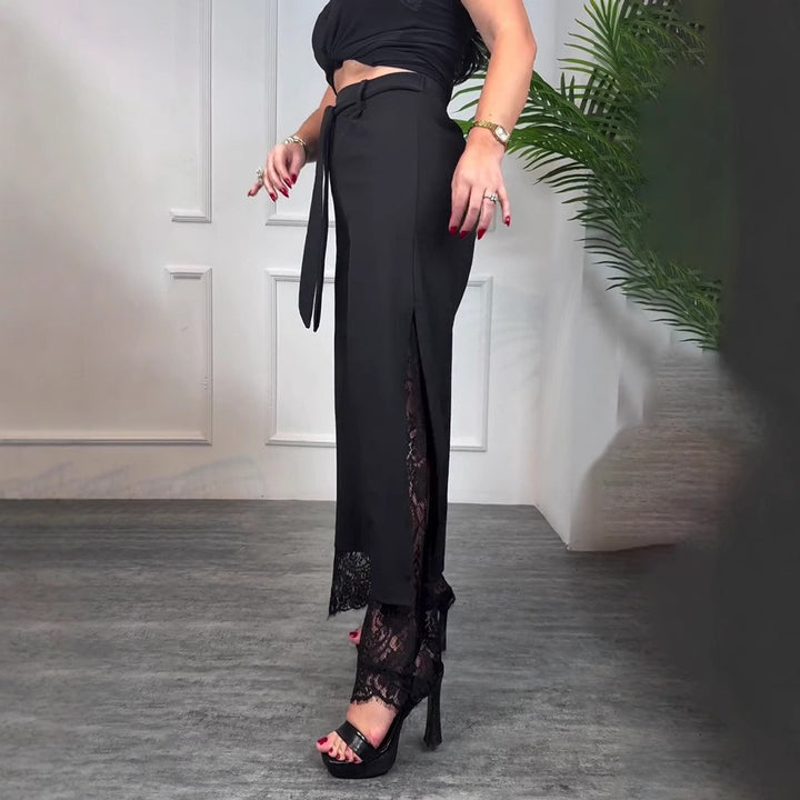 Women high-waisted tailored trousers with side slit, transparent lace underlay and tie belt Mune Fashion