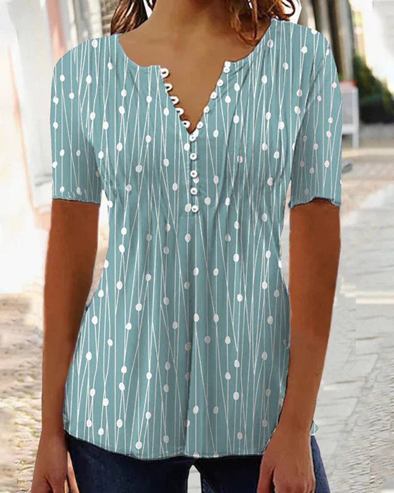 Women's airy V-neck blouse with short sleeves, decorative button placket and graphic dot stripe pattern Mune Fashion