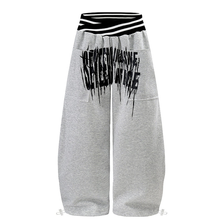 ladies culotte jogging pants with high-contrast waistband, patch pockets, and drawstring hem.
