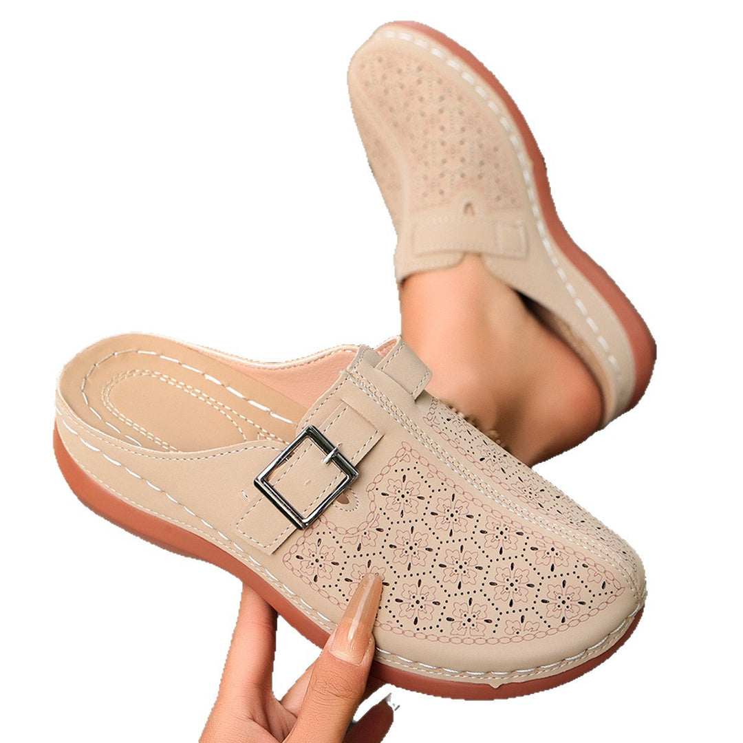 Women's comfort mule with adjustable buckled strap and ornamental hole embossing Mune Fashion