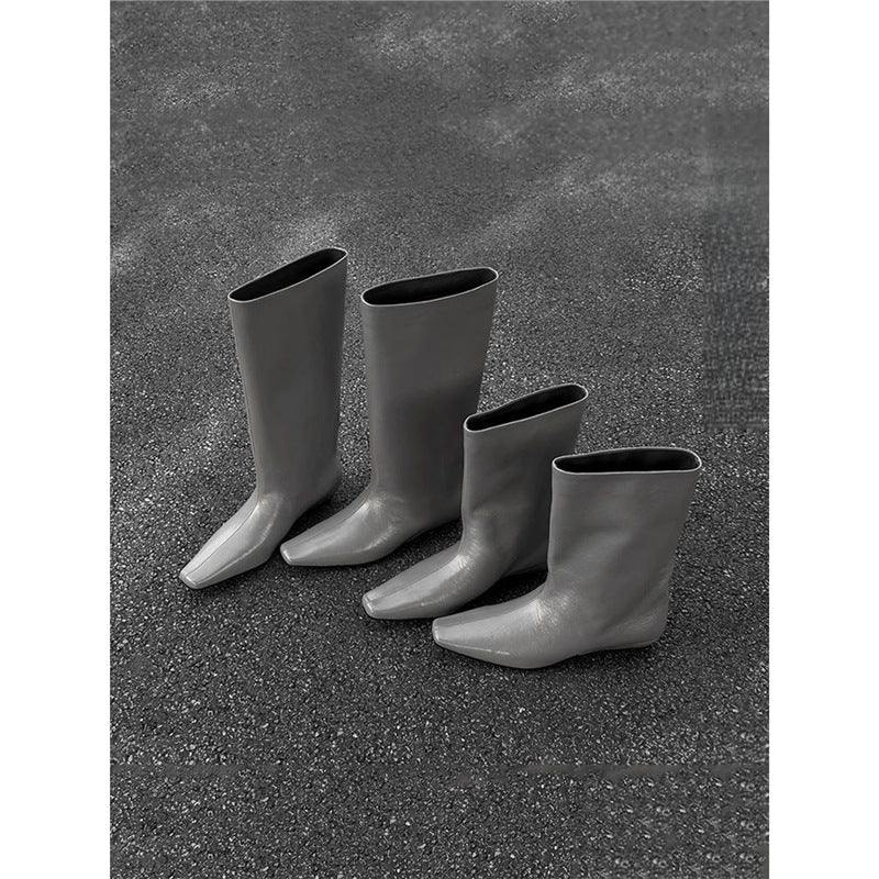 Women knee-high slouch leather boots with square toe shape and flat heel Mune Fashion