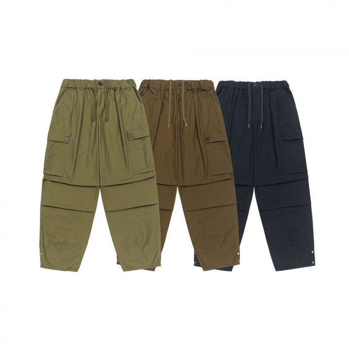 Unisex Oversize Cargo Pants with drawstring waistband, layer detail and snap hem Mune Fashion