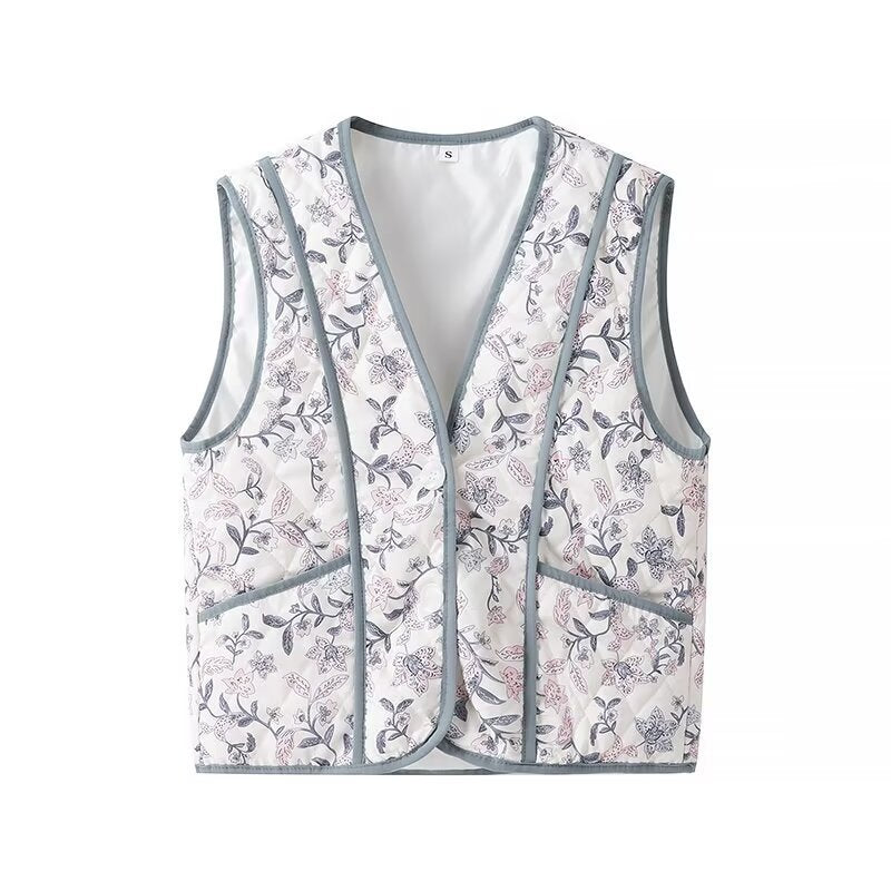 Women's light quilted vest with floral print, V-neck and side pockets Mune Fashion